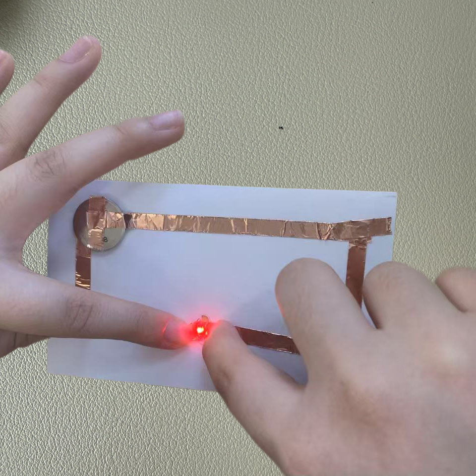 I applied pressure to the circuit to check the connection, and the LED illuminated in red.