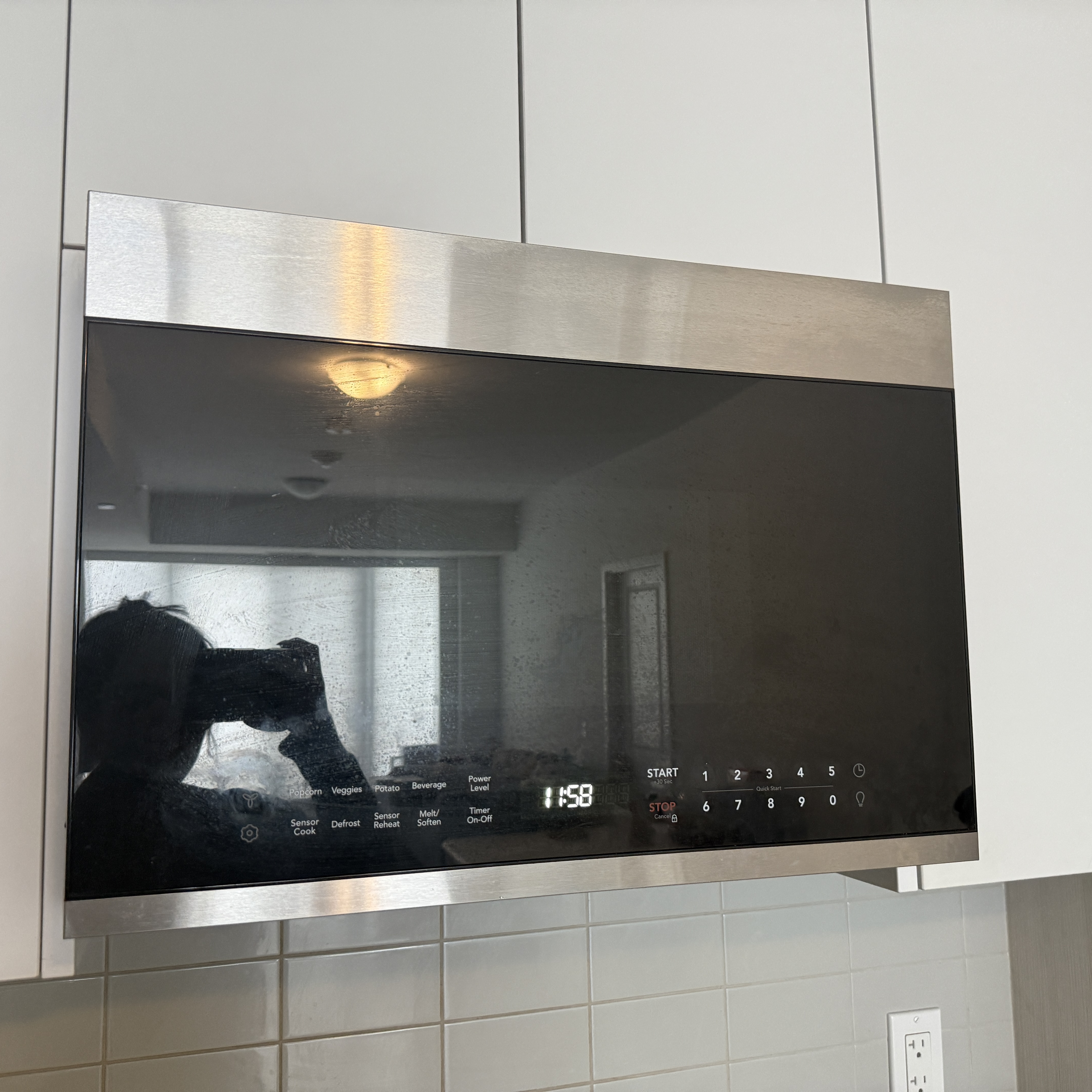  The low humming sound of a microwave operating, or the ding when it's done.s