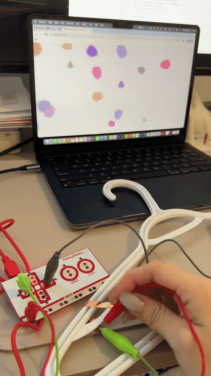 This piece activates bright visual bursts when triggered via Makey Makey. It gives the impression of dreamy fireworks illuminating the night sky.