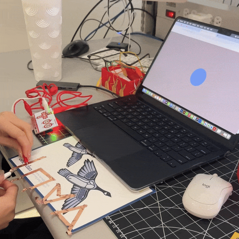 I use copper tape on paper to design interactive shapes. When I touch them, they trigger animations through Makey Makey.